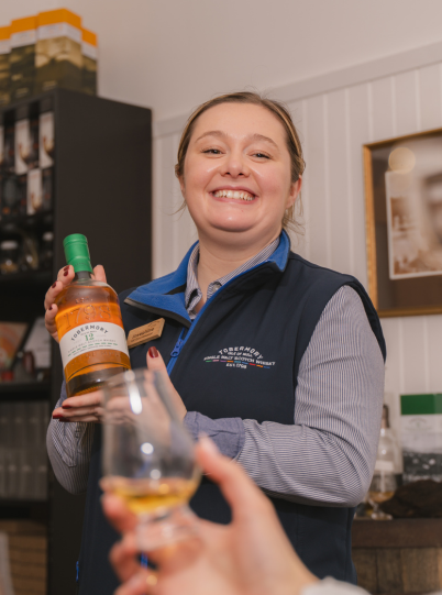Tobermory Distillery Tour Guide is leading a whisky tasting.