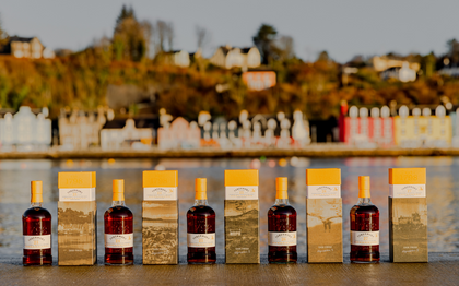 files/Tobermory-Hebridean-Series-Bottles-with-Packs-and-Tobermory-Bay-Backdrop-Blog-Header.png