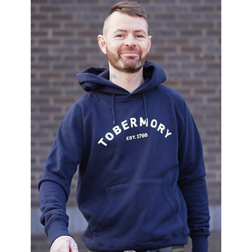 Tobermory whisky hoodie in black on a male model