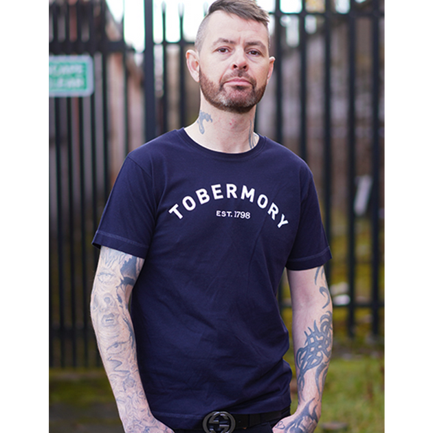 Tobermory unisex t shirt in black on a male model